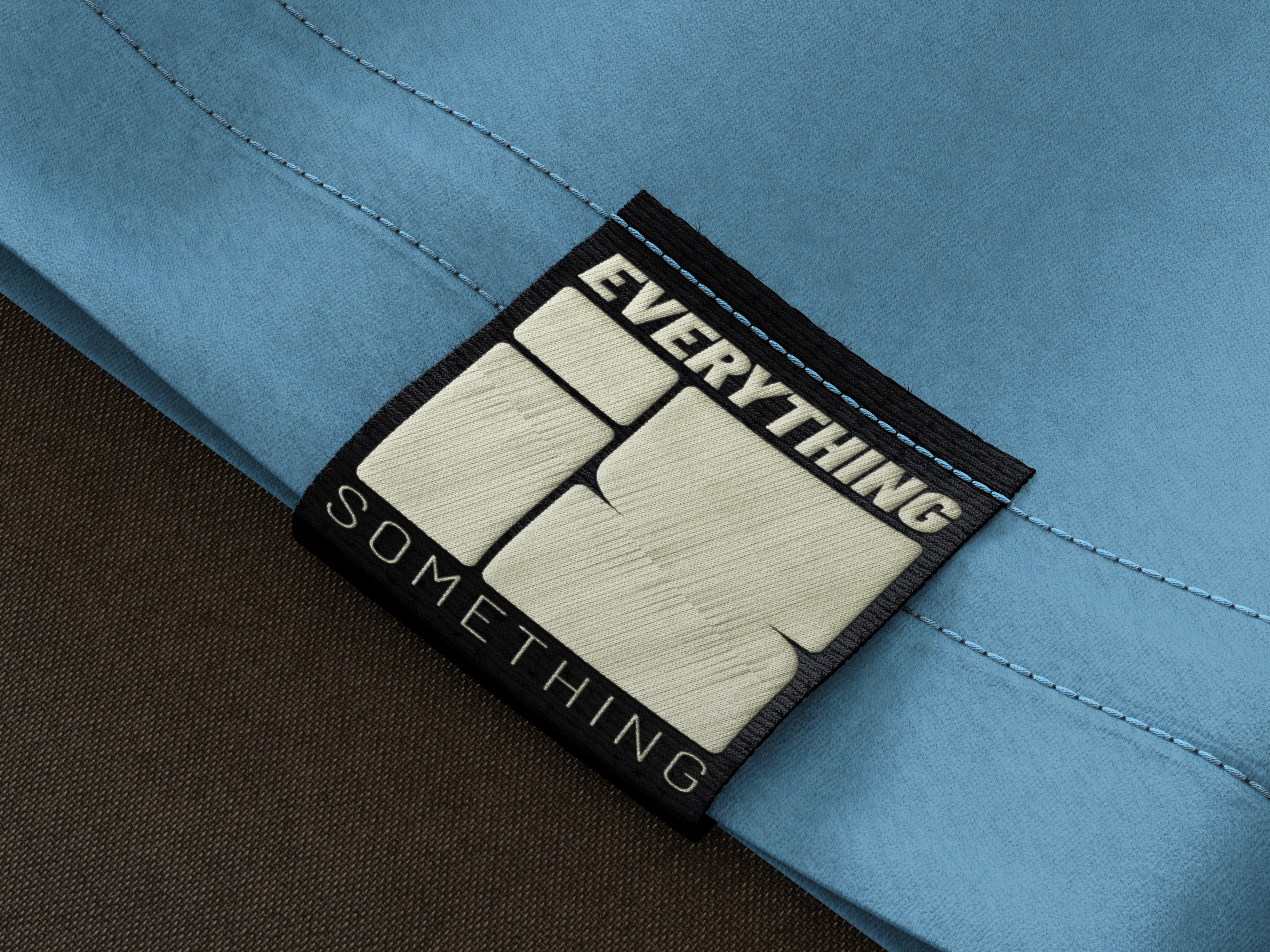 Everything Is Something — woven tag